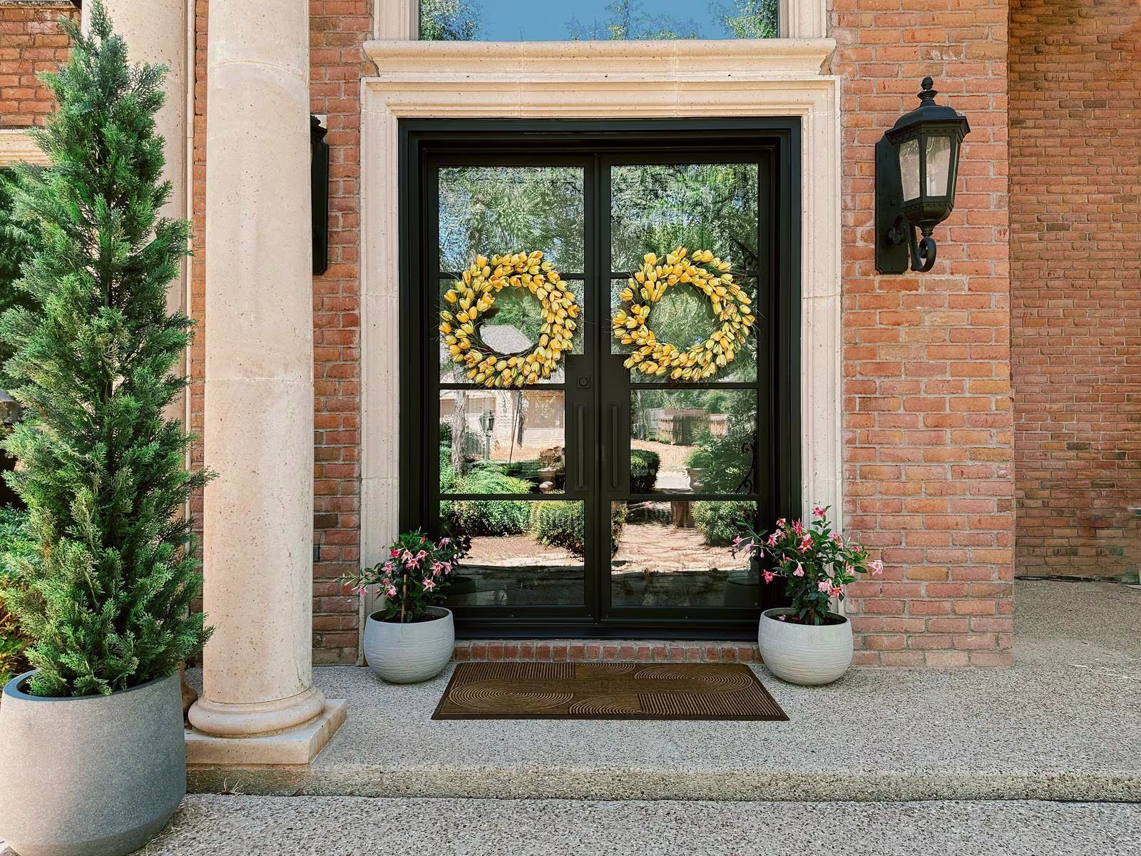 A beautiful entryway with the Ruggable Blossom Multicolor Estate Doormat