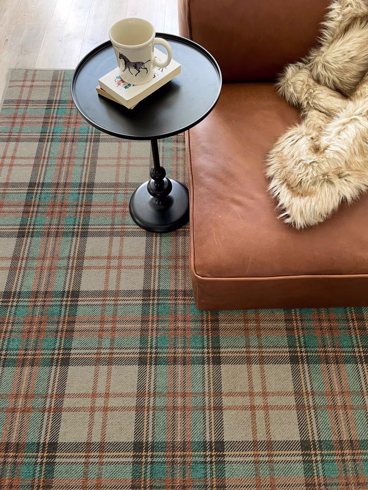 Washable Dress Stewart Tartan Khaki from Ruggable beneath leather chair with equestrian decor