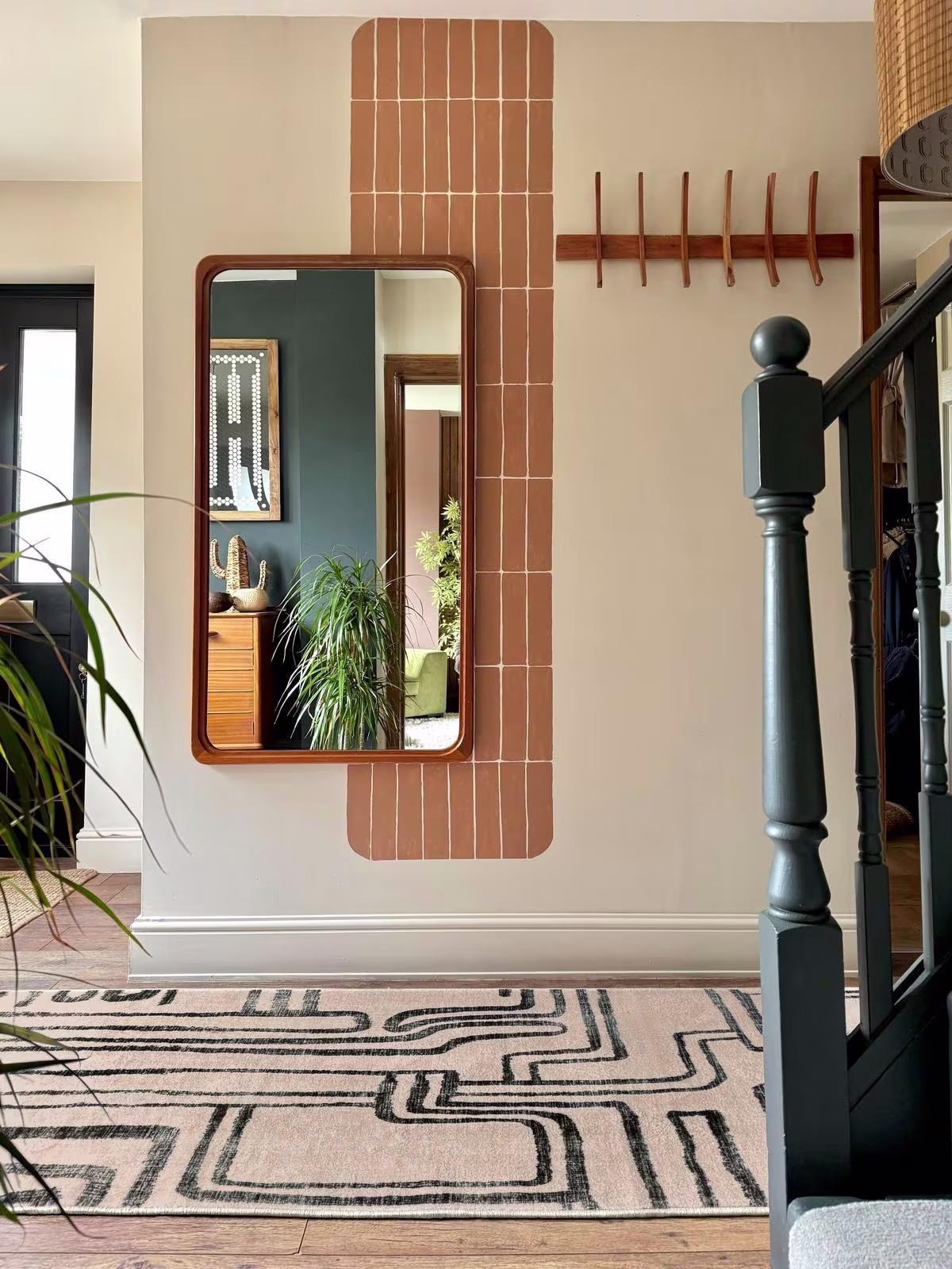 Ruggable x Malene Barnett Kassena Black & Ivory rug in entryway with eclectic global decor