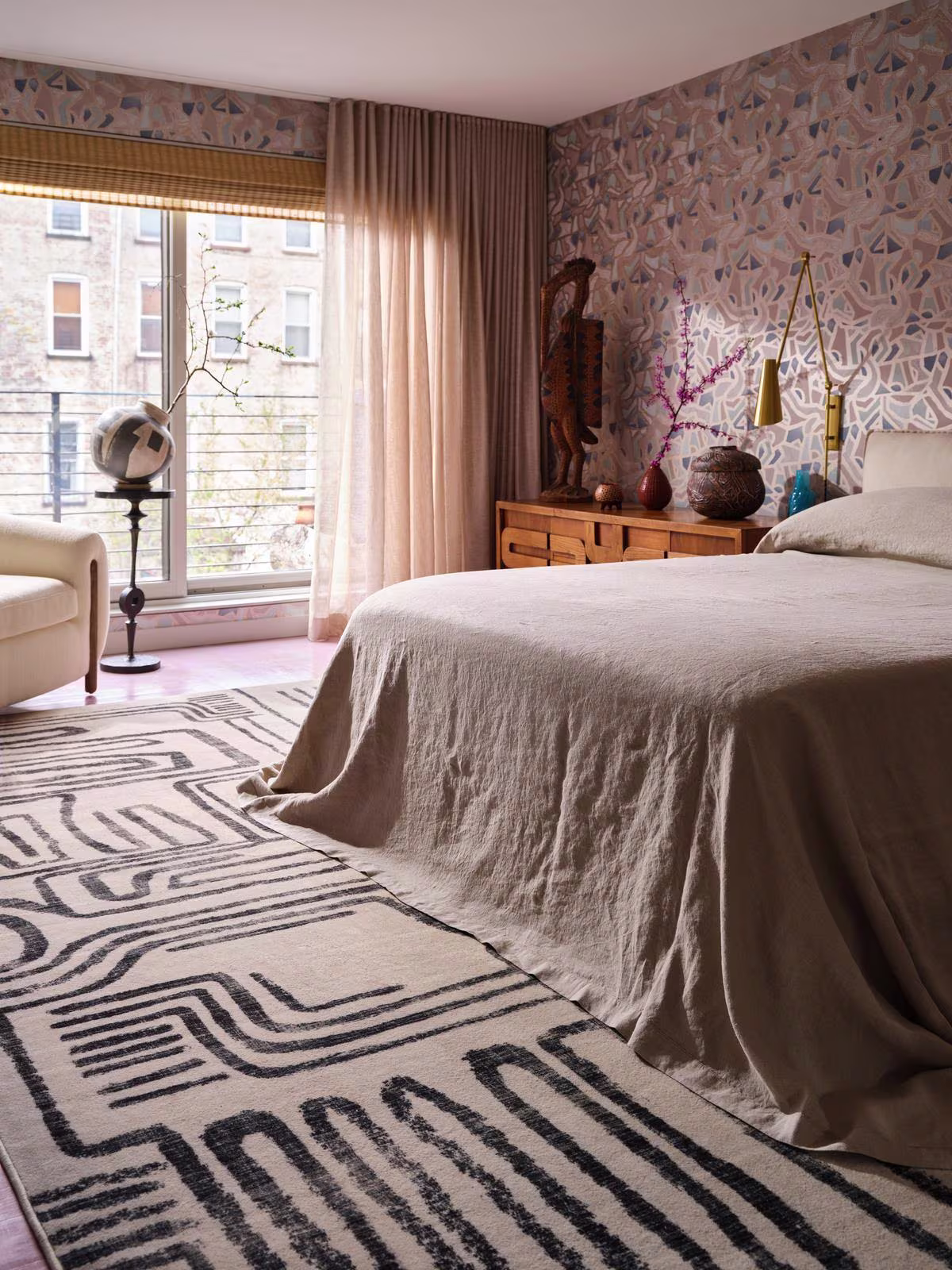 Ruggable x Malene Barnett Kassena Black & Ivory Rug in bedroom with wallpaper and handcrafted art