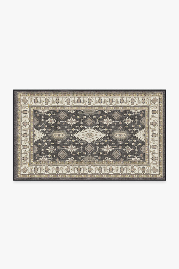 https://images.ctfassets.net/9y4fi2gkk4ov/2glQoQutN1JxuW1C2Cv3uH/4047650f4dbecd66428cbbe0b8a09dfe/Outdoor_Ranier_Dark_Wood_Rug_3x5.jpg