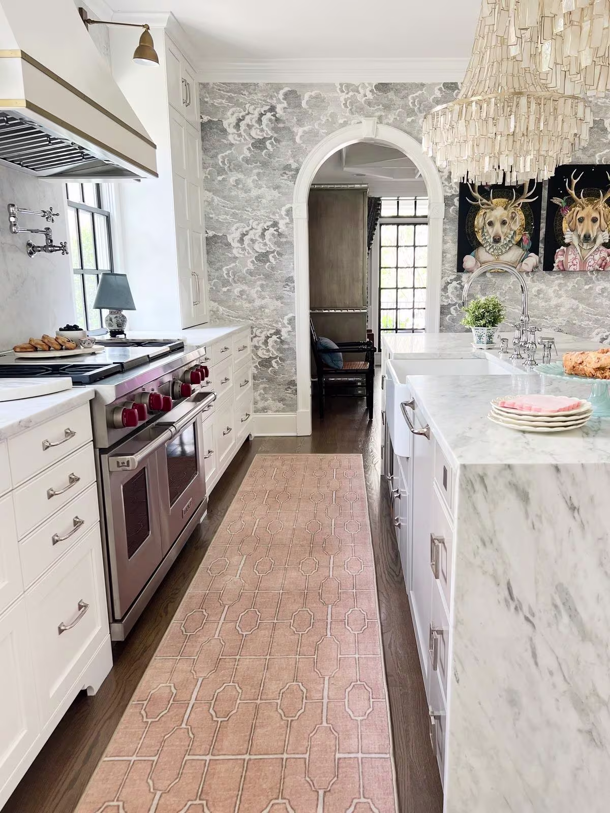 Ruggable x The Hiltons Diana Trellis Rose Gold Rug runner in marble traditional kitchen with etched cloud wallpaper and arched doorway