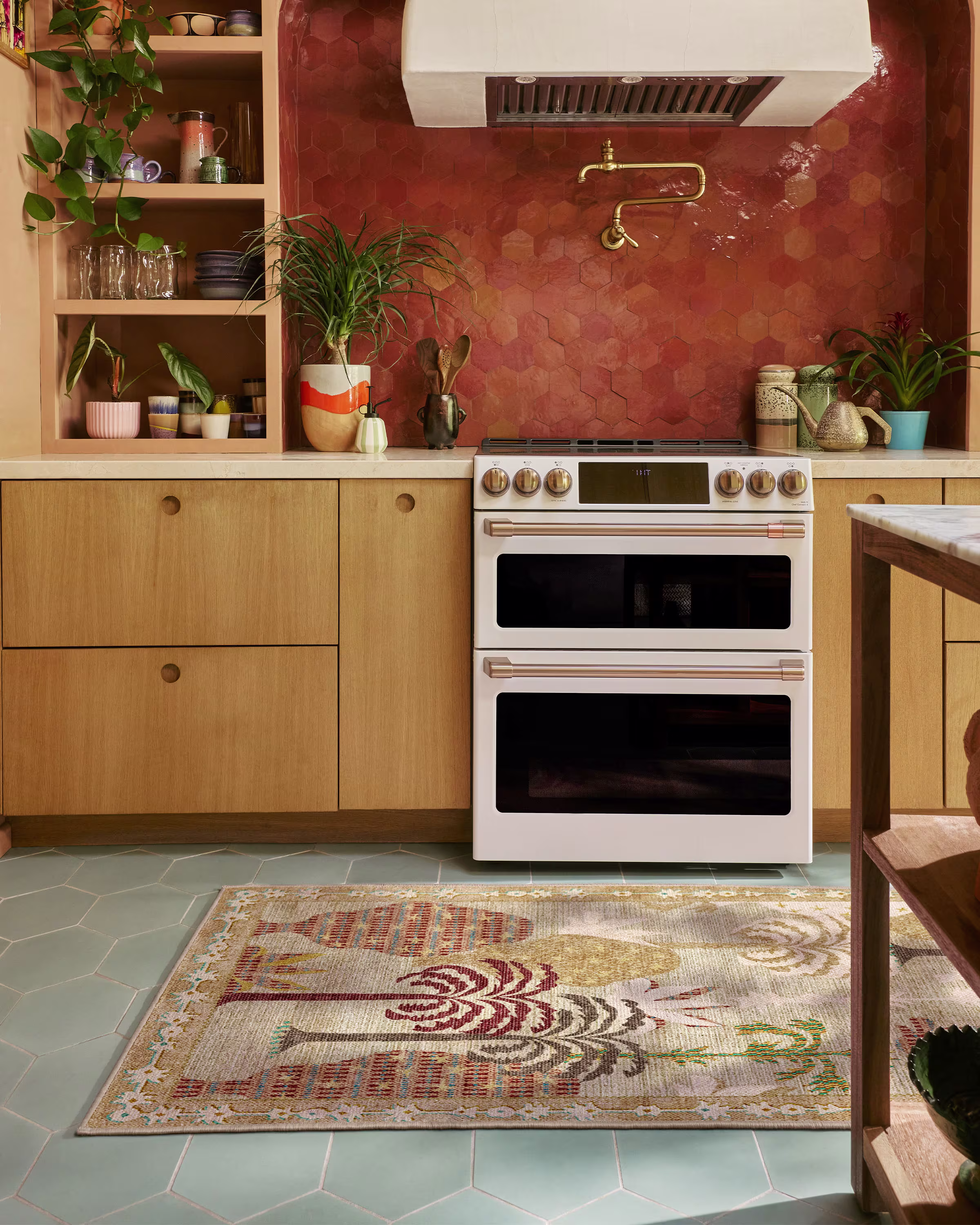 Ruggable x Jungalow Palmistry Natural tufted runner rug with a palm tree motif in a bohemian kitchen setting.