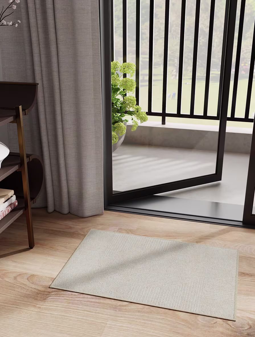 The Hiltons Bel Air Ivory Tufted japandi rug styled in a living room with warm wood accents