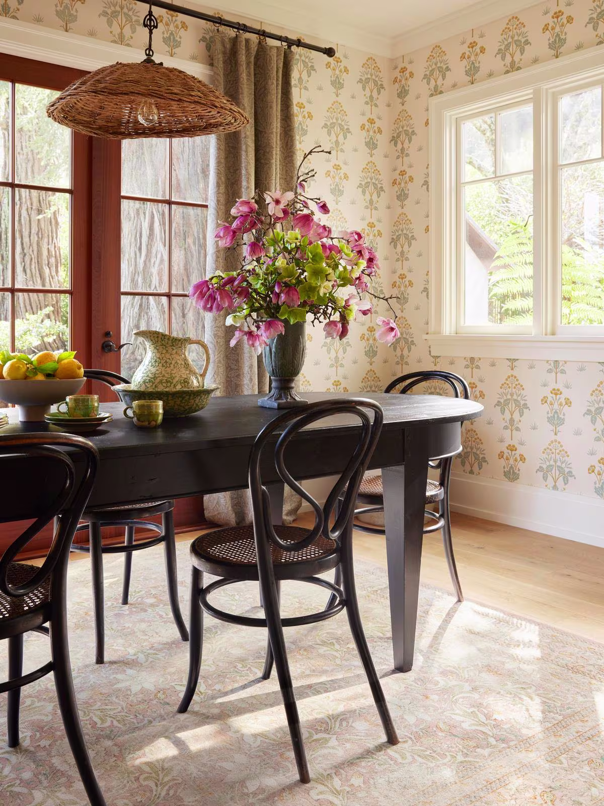 Ruggable x Morris & Co. Simply Severn Soft Pink rug in dining room with Morris & Co. wallpaper and large floral arrangement