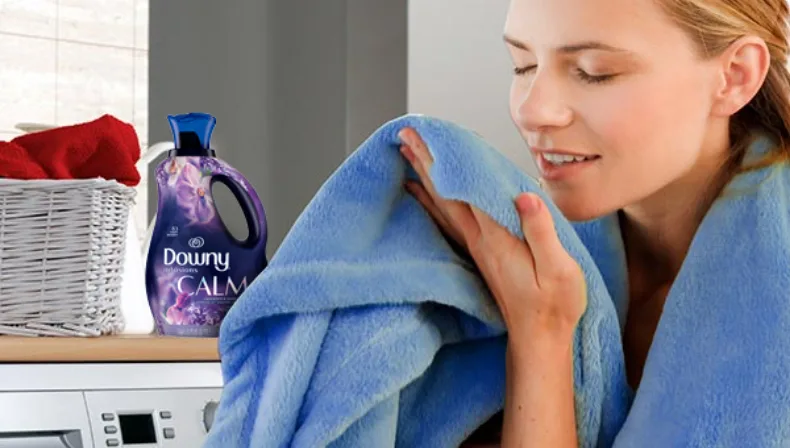 Make your blankets more inviting than ever with Downy fabric softeners