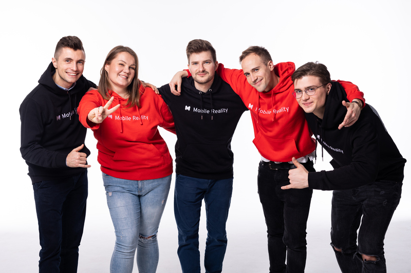 a group of people posing for a picture