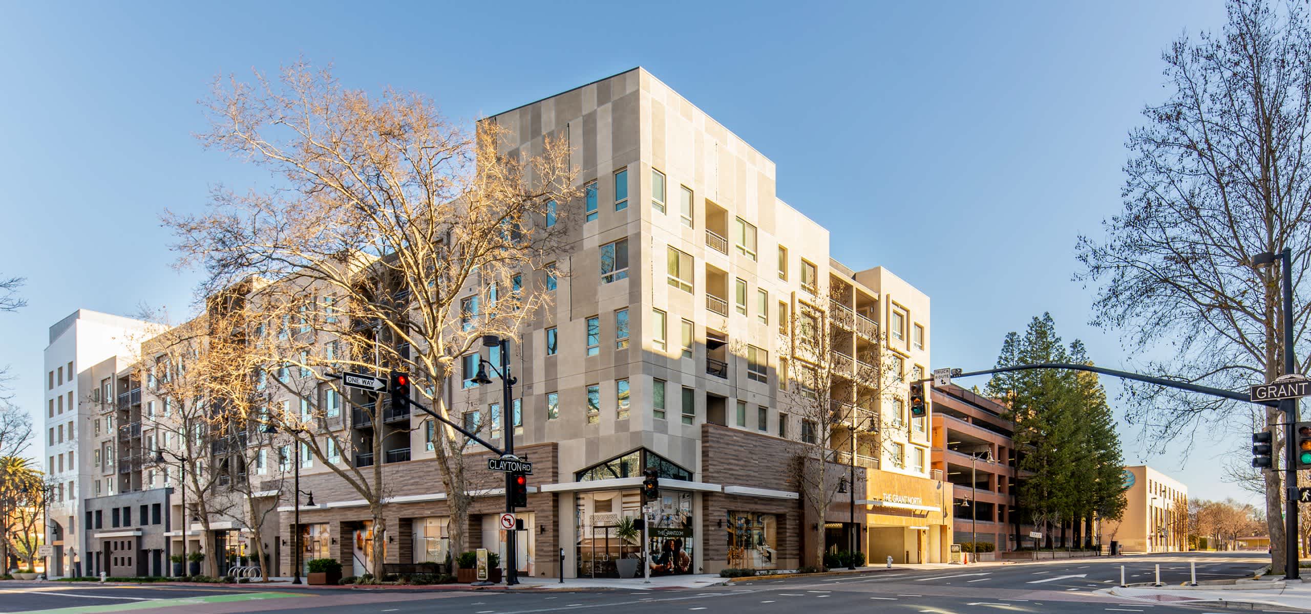 Mixed-use apartment building with retail frontage and articulated facade—The Grant demonstrates how smart design drives success in infill development.