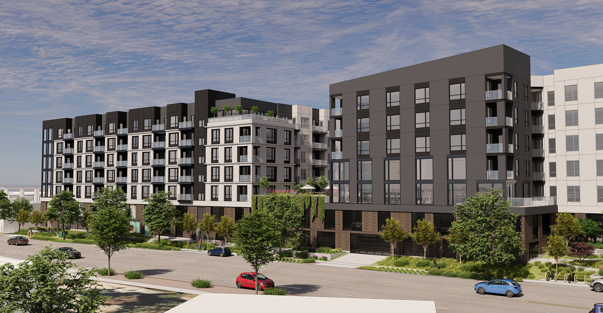 Street-facing view of Fabian Way’s mid-rise multifamily buildings, exemplifying how landowners can transform urban parcels into premium rental communities.