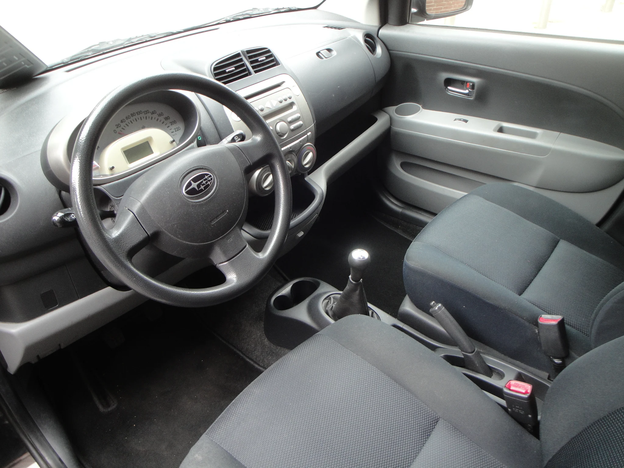 Subaru Justy 1.0 Comfort S. 5-Drs. o.a. Airco, Audio & AUX, CPV & afst.bed., & LM-velgen. - Thumbnail 10