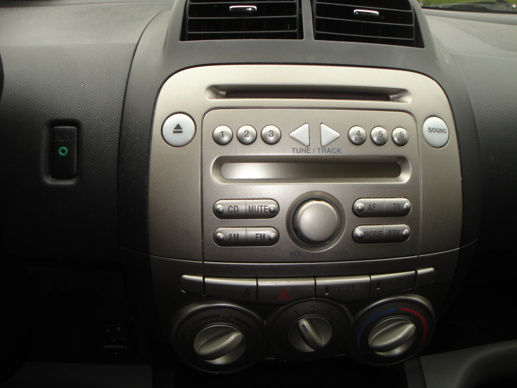 Subaru Justy 1.0 Comfort S. 5-Drs. o.a. Airco, Audio & AUX, CPV & afst.bed., & LM-velgen. - Thumbnail 12