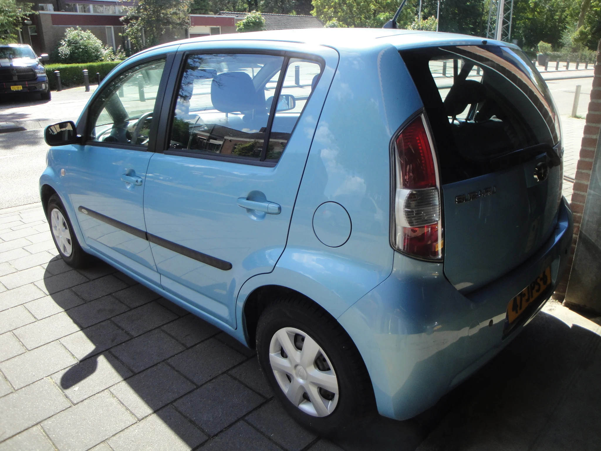 Subaru Justy 1.0 Comfort 5-Drs. o.a. Airco, Audio, CPV & afst.bed., P.sens.A. en 4.Seizoenen-banden. - Thumbnail 3