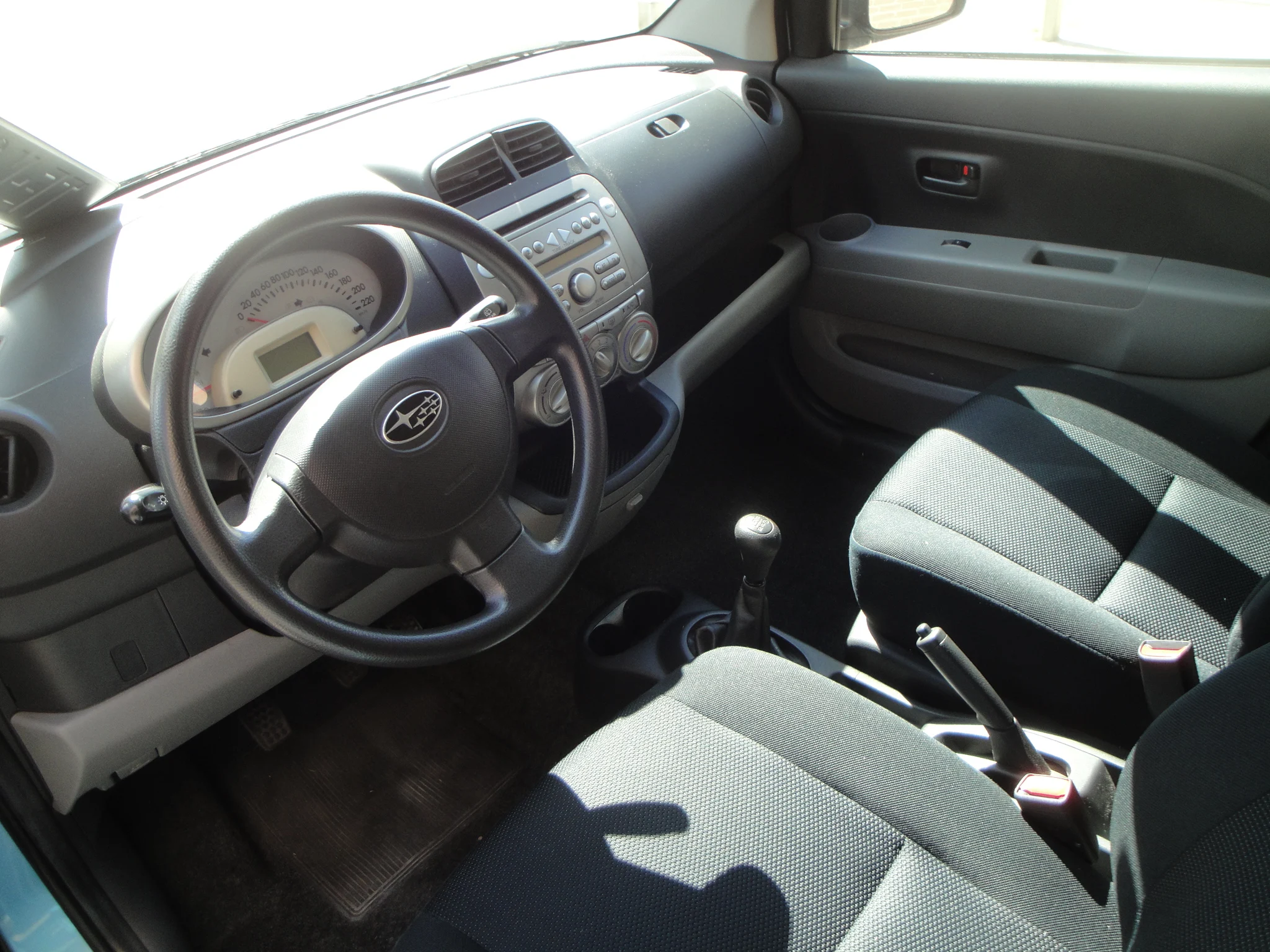 Subaru Justy 1.0 Comfort 5-Drs. o.a. Airco, Audio, CPV & afst.bed., P.sens.A. en 4.Seizoenen-banden. - Thumbnail 8