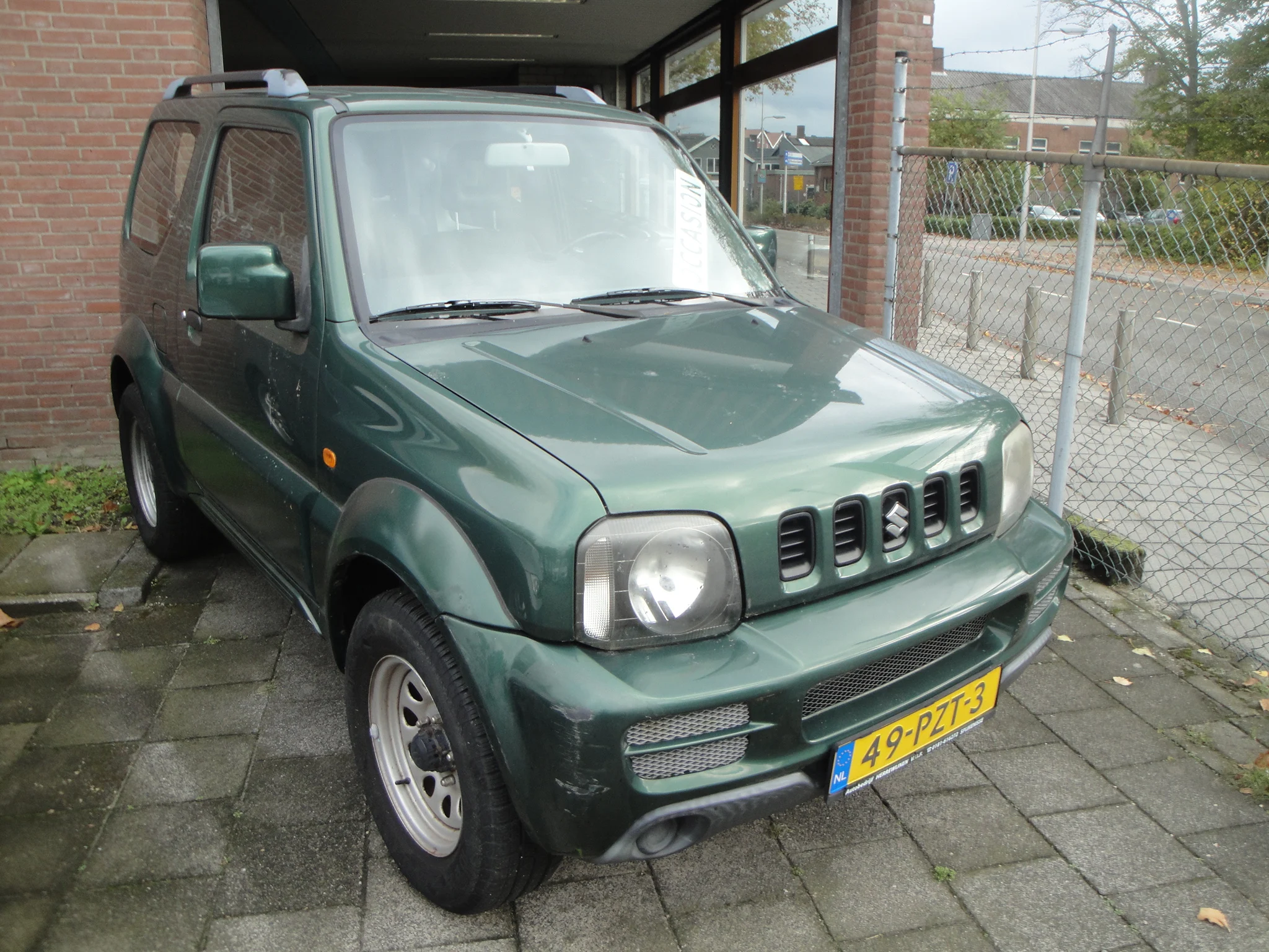 Suzuki Jimny 1.3 JLX TOP 4WD (1e Eig./2011/86.600KM) - Afbeelding 1