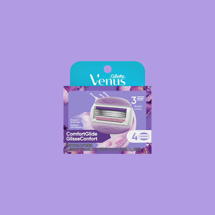 Recharge de lame Gillette Venus Comfortglide Freesia avec un arrière-plan violet.