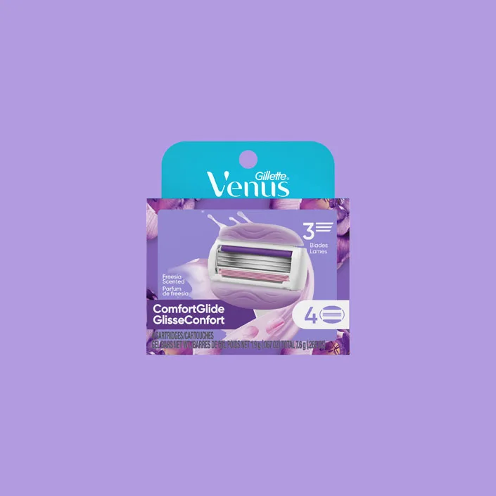 Venus ComfortGlide Freesia Scented refill packaging with 4 cartridges, 3 blades, and gel bars