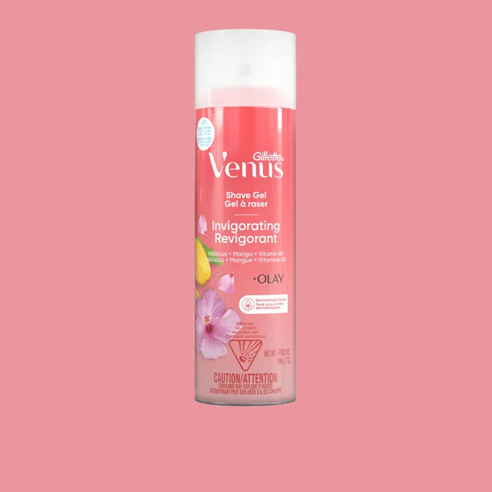 Gillette Venus Invigorating shave gel can with hibiscus mango and vitamin B5 on pink background