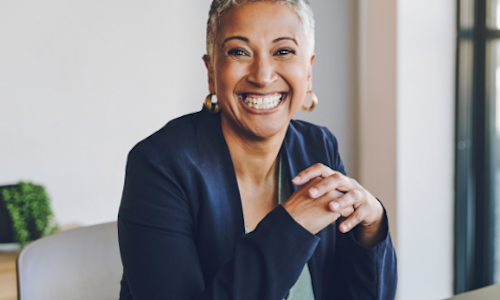 Confident female advisor smiling at the camera