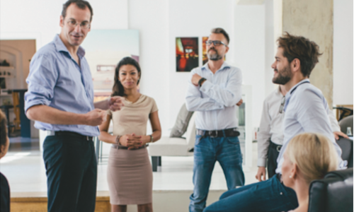 a team of financial advisors meets to discuss PR opportunities