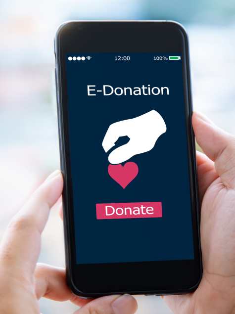 an iPhone displaying a charitable donation on-screen