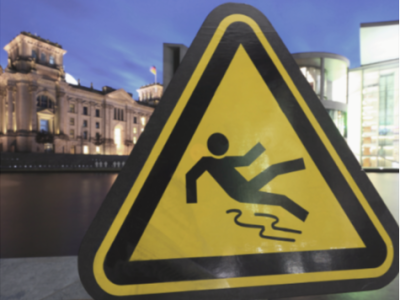 a yellow slippery when wet sign helps protect a business from liability