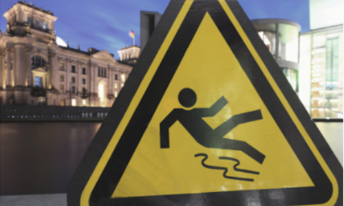 a yellow slippery when wet sign helps protect a business from liability