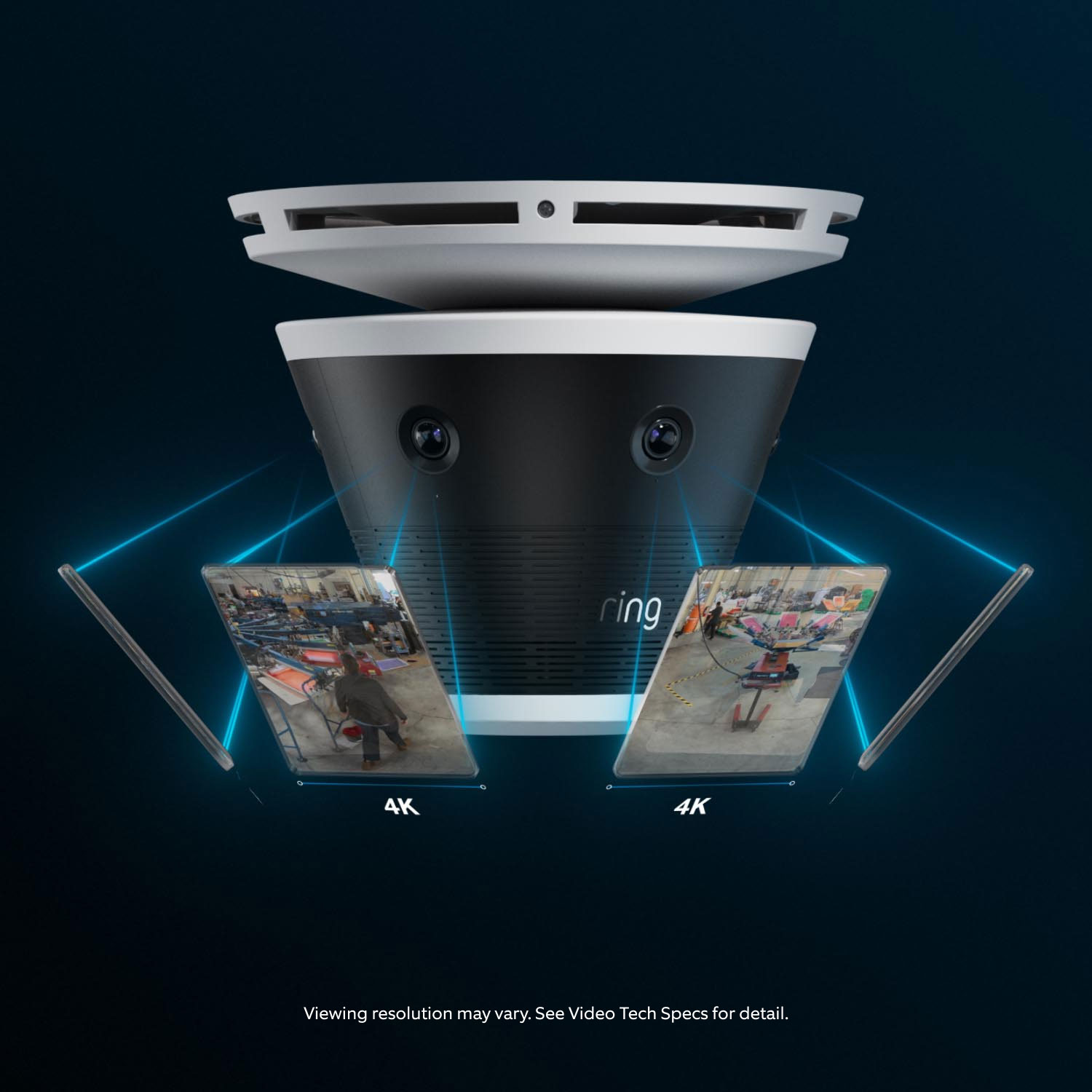 Ring Elite 360 4K - Close-up of a Ring ceiling-mounted camera with multiple lenses, showing two projected 4K video panels from a workshop scene.