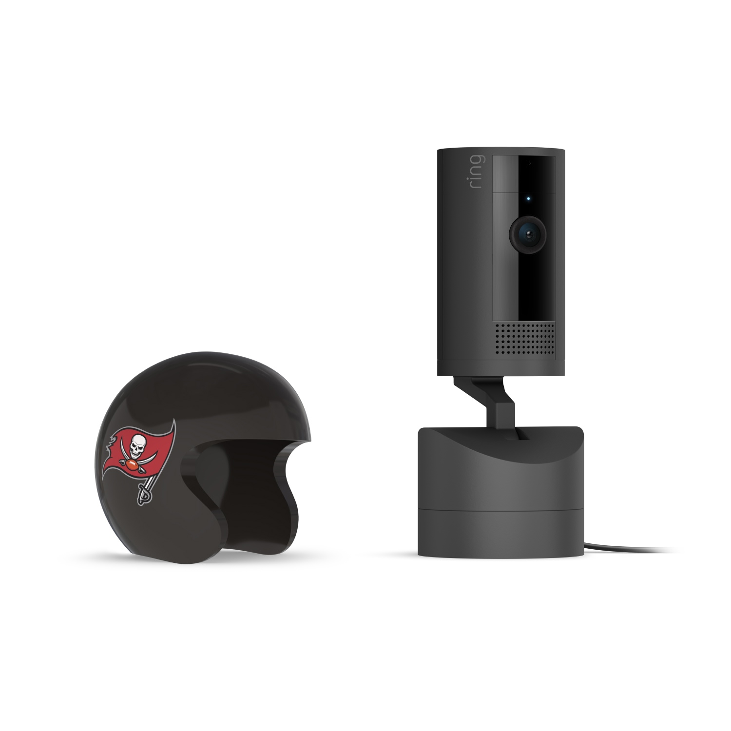 Pan-Tilt Indoor Cam, Black + NFL Game Day Cam Cover — NFC - Black Ring indoor camera on a stand next to a small black helmet with a red Tampa Bay Buccaneers logo, on a white background.
