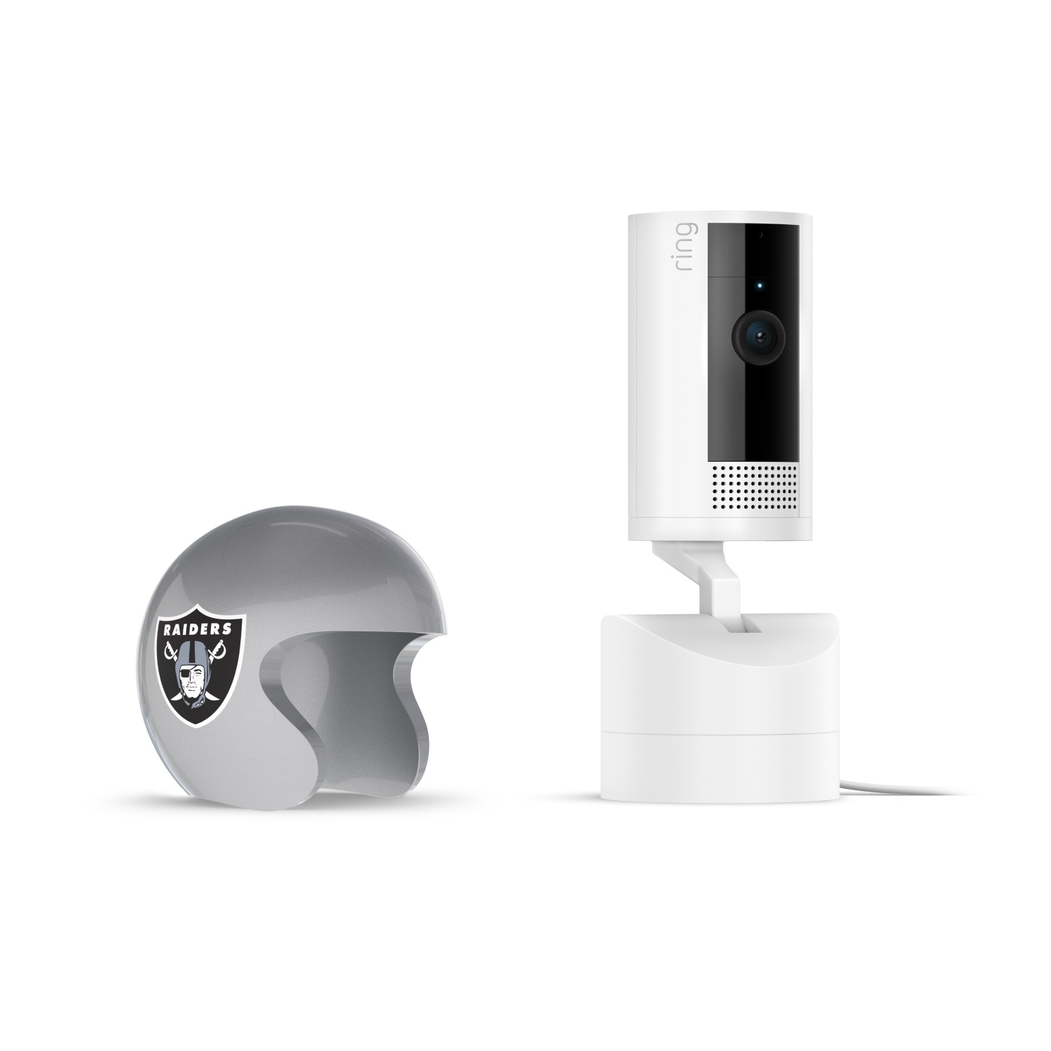 Pan-Tilt Indoor Cam, White + NFL Game Day Cam Cover — AFC - White Ring Pan-tilt indoor camera on stand beside a gray Raiders mini helmet with team logo, set against a clean white background.