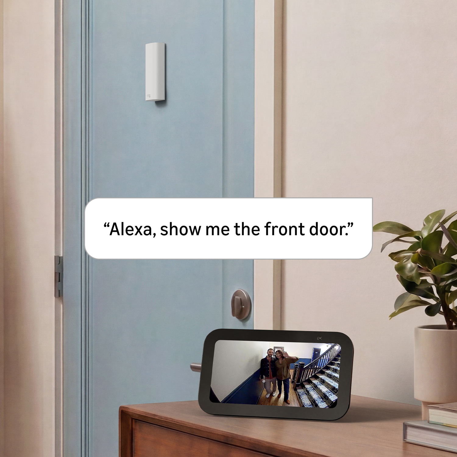 Peephole Cam 2K - Smart display on a table shows a front-door camera view after the voice command “Alexa, show me the front door.”