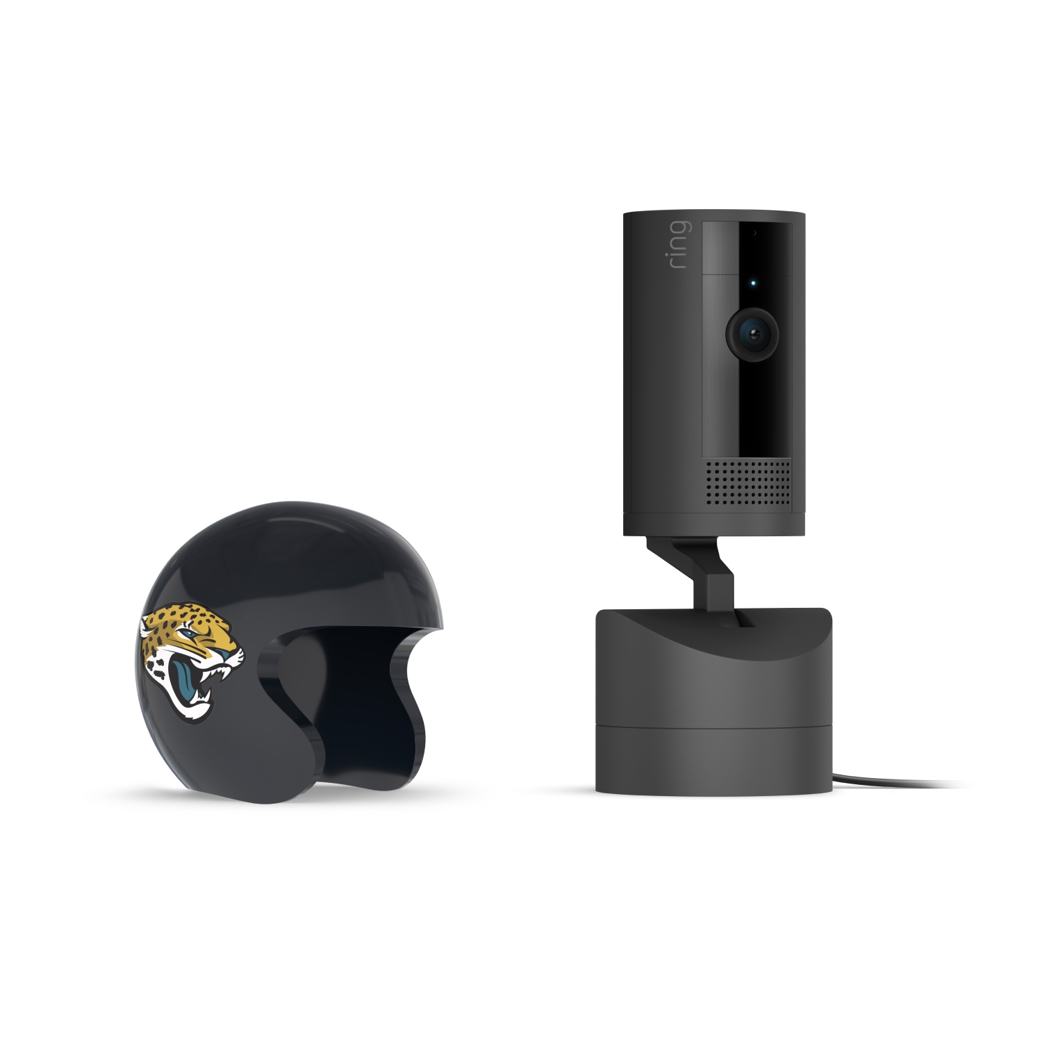 Pan-Tilt Indoor Cam, Black + NFL Game Day Cam Cover — AFC - Black Ring indoor camera on a stand beside a small black helmet with a jaguar logo, set against a white background.
