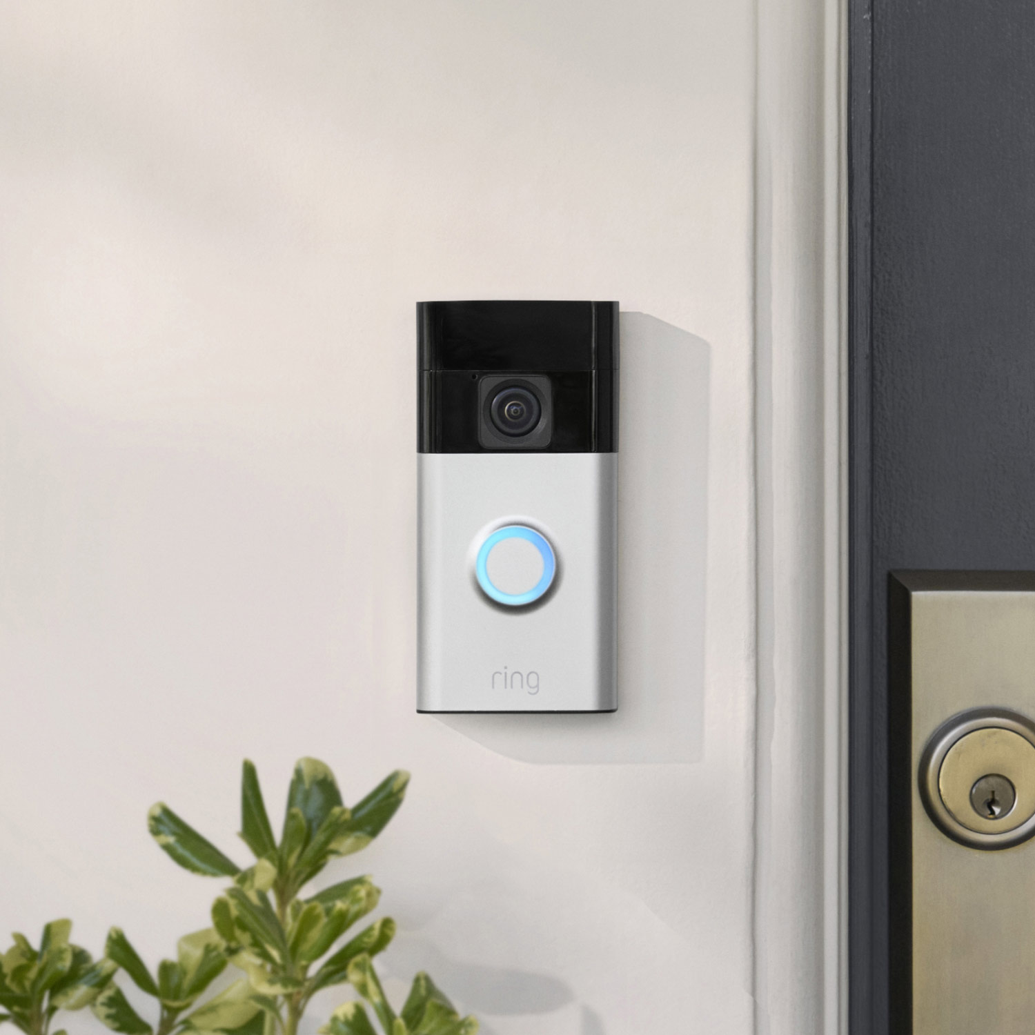 Battery Doorbell + Stick Up Cam + Alarm 8-Piece Security Kit - Battery doorbell mounted to an exterior wall next to the front door.