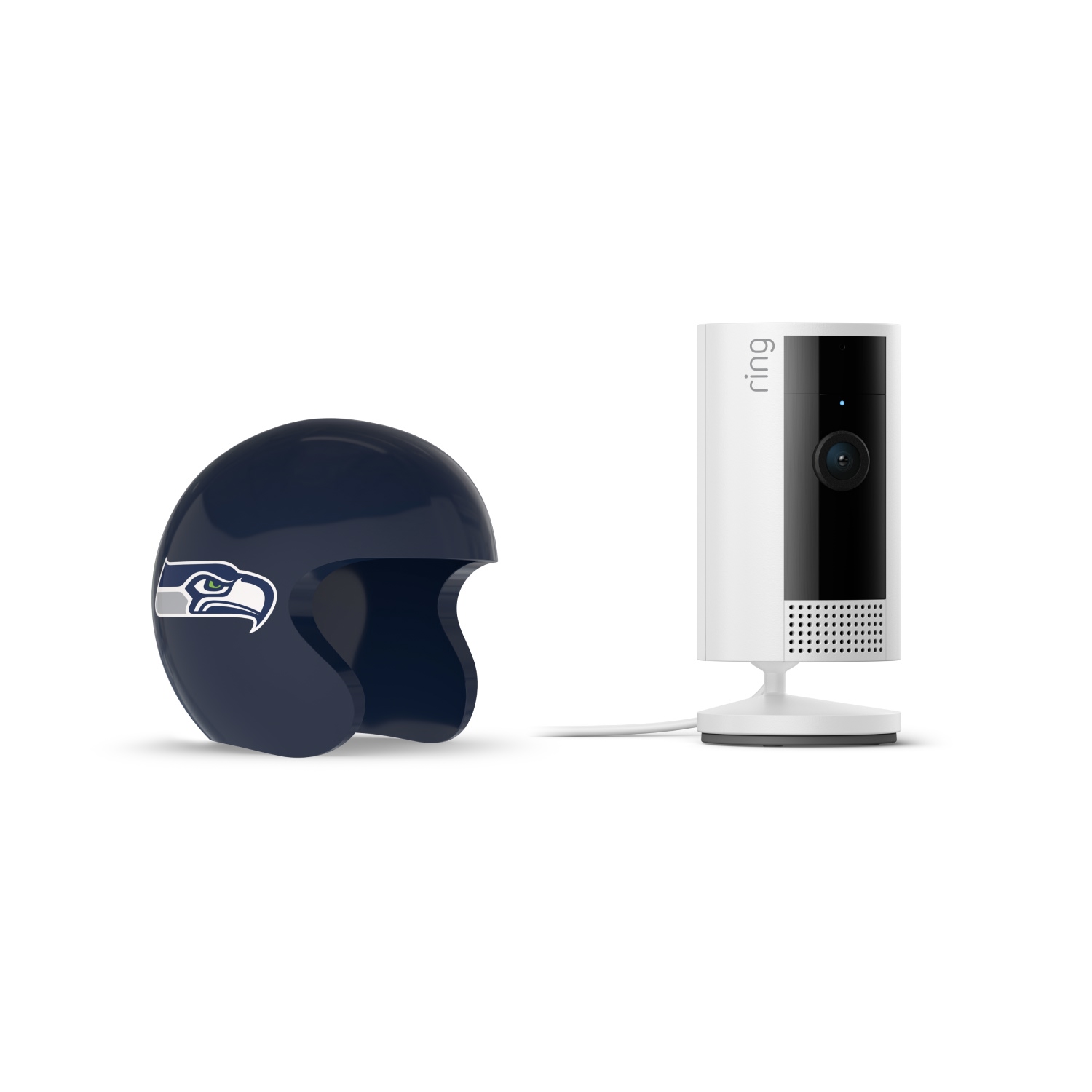 Indoor Cam, White + NFL Game Day Cam Cover — NFC - Ring indoor camera beside a navy Seattle Seahawks mini helmet on a white background.