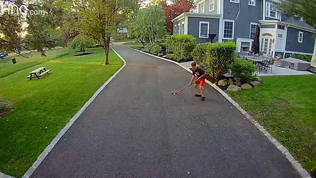 Teen practicing hockey skills, breaks the garage window and calls his mom to apologize