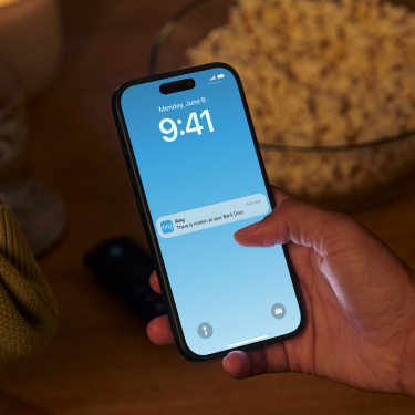 Mobile phone with a Ring motion detector mobile banner notification.