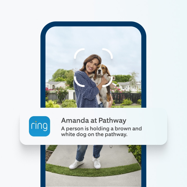 Ring app alert on a phone reads “Amanda at Pathway. A person holding a brown and white dog on the pathway.”