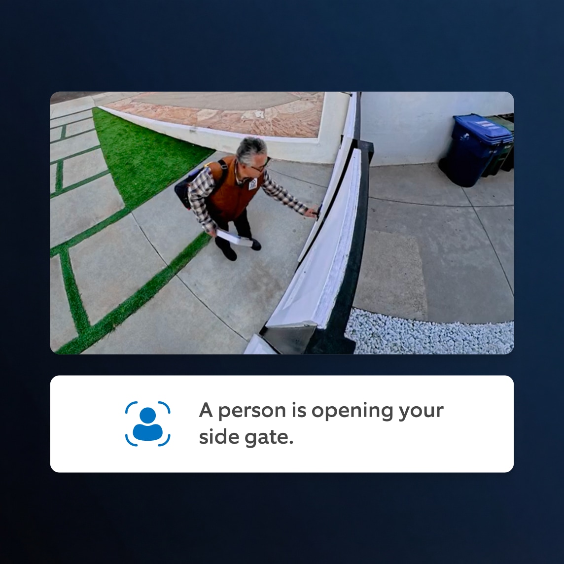 Person in orange vest and plaid shirt opening a side gate, captured by doorbell camera with notification below.