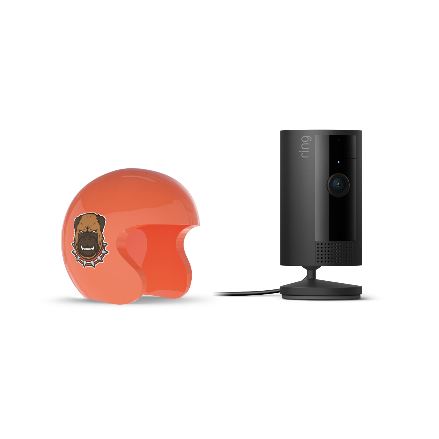 Indoor Cam, Black + NFL Game Day Cam Cover — AFC - Orange open-face helmet with a bulldog sticker next to a black Ring indoor camera on a stand with power cable. White background.