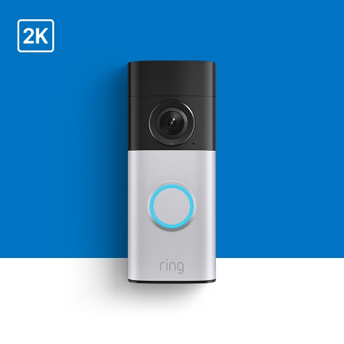 Ring doorbell camera with 2K resolution, silver base, black camera top, and blue illuminated button against blue background.