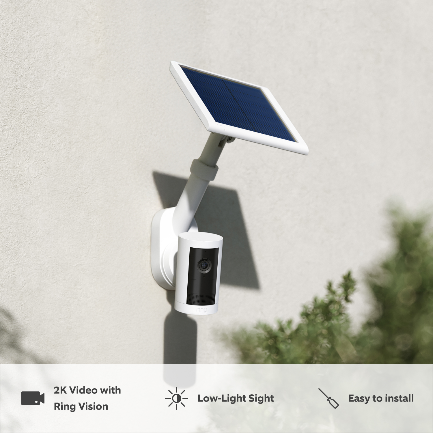 Outdoor Camera Plus Solar + Pole and Wall Mount (Featuring Retinal 2K) - Solar:White Outdoor Camera Plus Solar mounted to neutral wall  outside