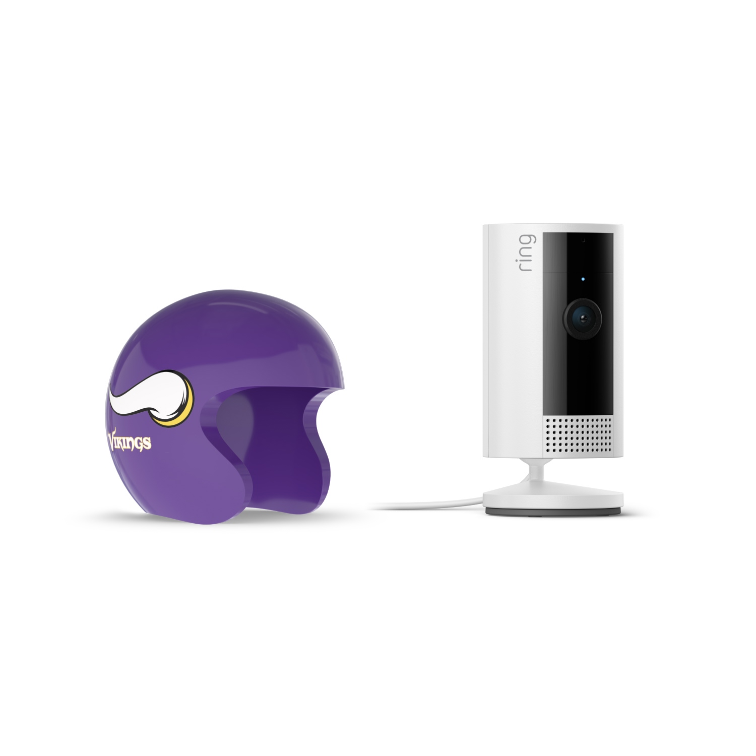 Indoor Cam, White + NFL Game Day Cam Cover — NFC - White Ring indoor camera on a stand next to a purple Minnesota Vikings mini helmet cover on a plain white background.