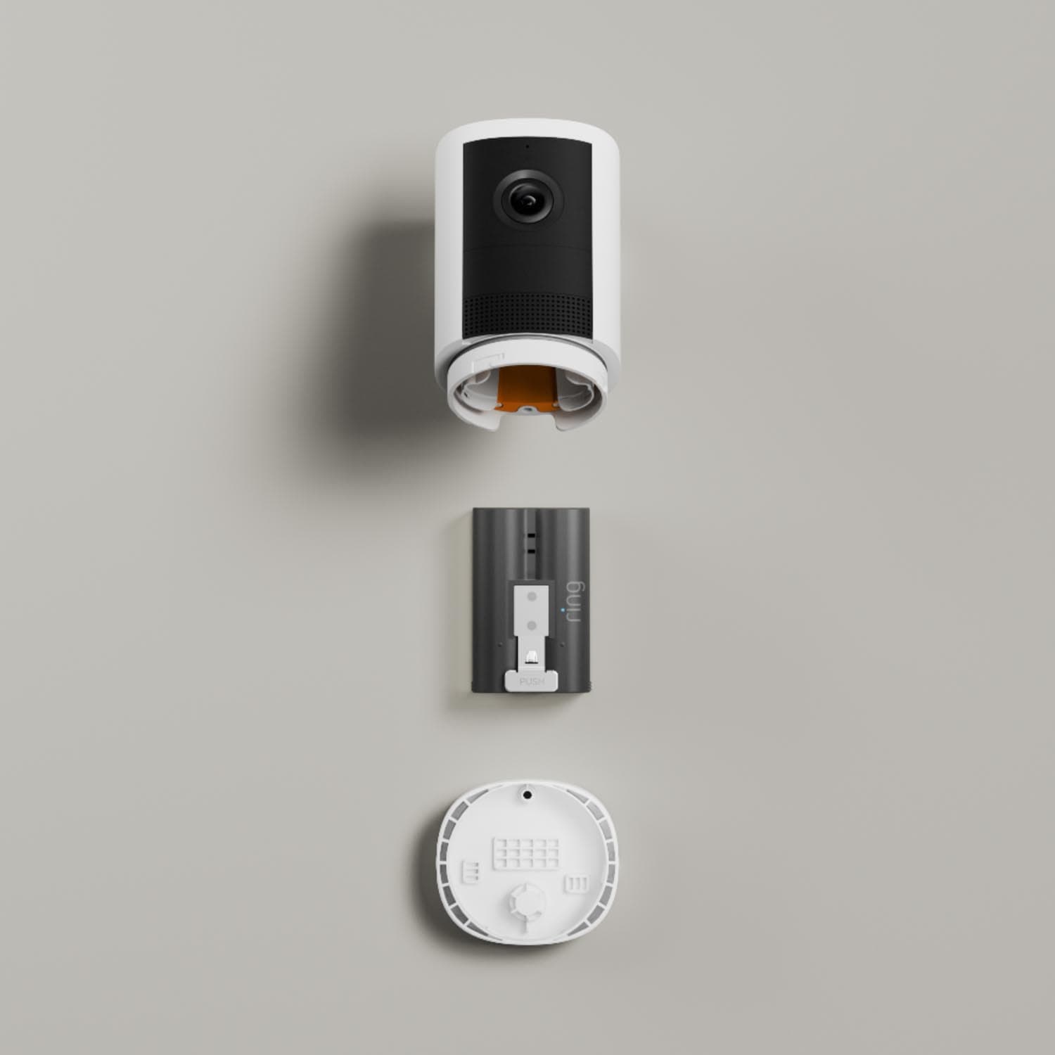 Outdoor Cam (Newest Model)  - Battery:Outdoor Cam (2nd Gen) battery pack, and round mounting plate aligned on a gray background.