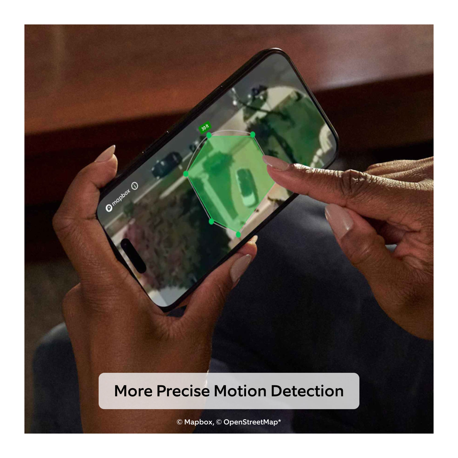 Wired Doorbell Plus (Newest Model) (Featuring Retinal 2K) - Two hands holding a phone with the Ring app on the screen. The screen shows the 3D Motion Detection feature and the person's hand is using their finger to draw a zone they wish to get detection in. 