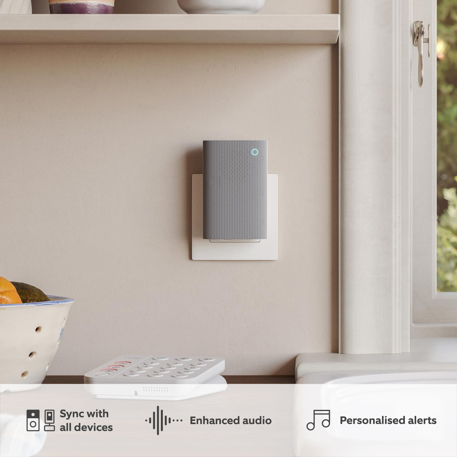 Chime Plus - Chime Plus plugged into powerpoint on cream kitchen wall