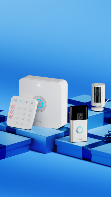 Green and gold-wrapped holiday presents unwrapping themselves, revealing a Ring security devices.