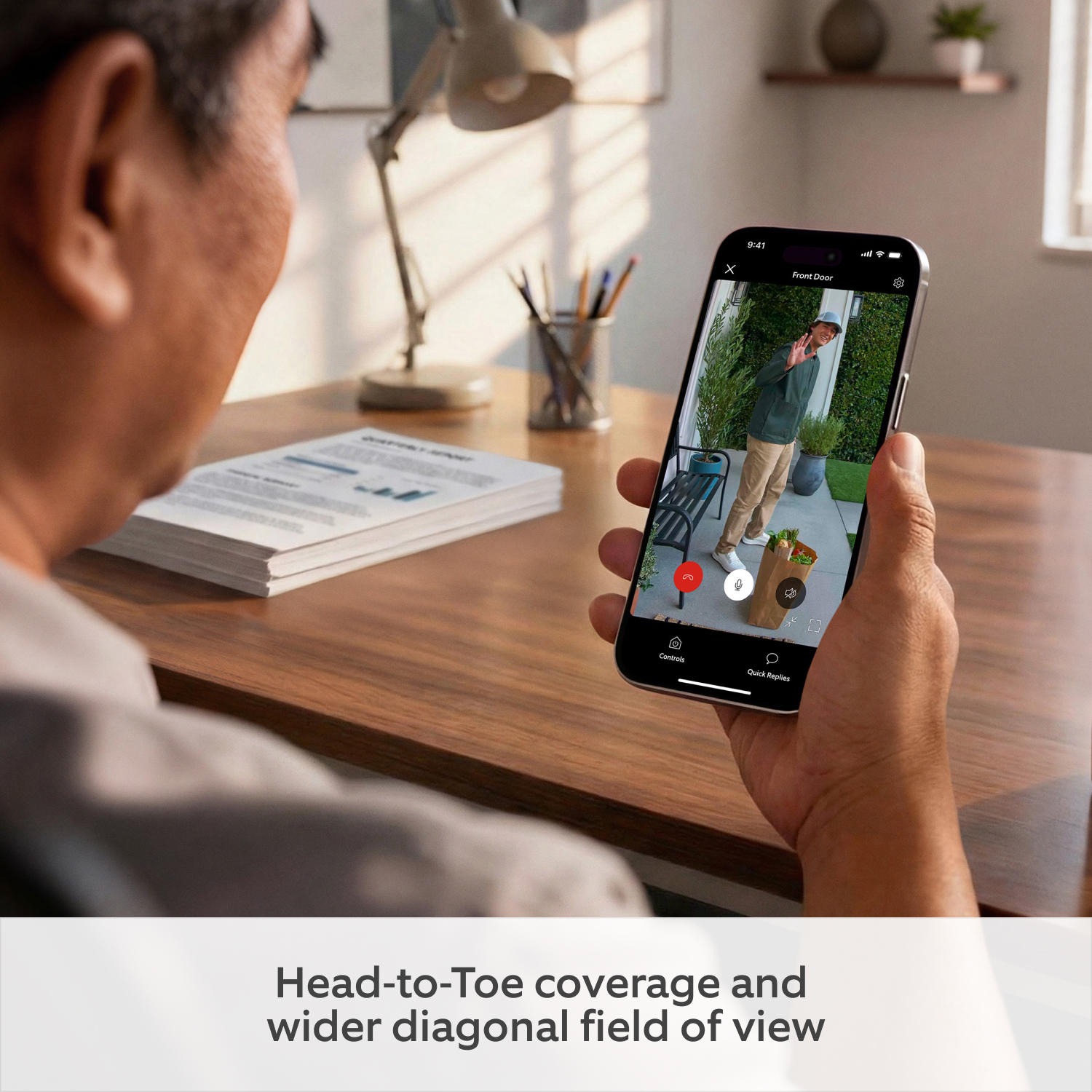  Wired Video Doorbell (2nd Gen) (Featuring Retinal 2K) - Man holding phone open to Ring app with Doorbell live view showing head-to-toe coverage