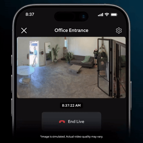 Ring Elite 140 4K - Smartphone screen showing live view titled “Office Entrance”: a person walks through a lobby with a gray sofa, plants, and a table.