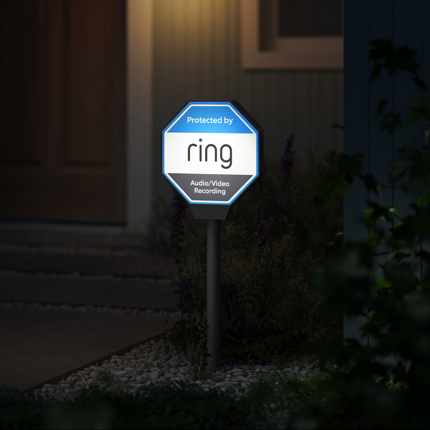 Ring Beacon - Illuminated Ring Beacon sign in a garden at night, showcasing the product's visibility and security features for home protection.