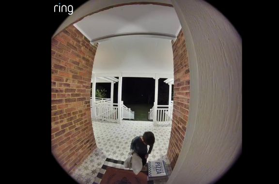 Doorbell recording of boy at door calling out to mum to open up as he brings in the pizza delivery left outside.