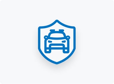 Blue outline icon of a police car inside a shield on a light gray background, symbolizing safety or law enforcement services.